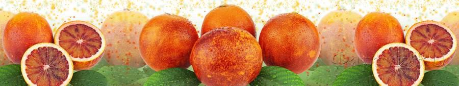 Скинали — Спелые красные апельсины с разрезом и зелеными листьями