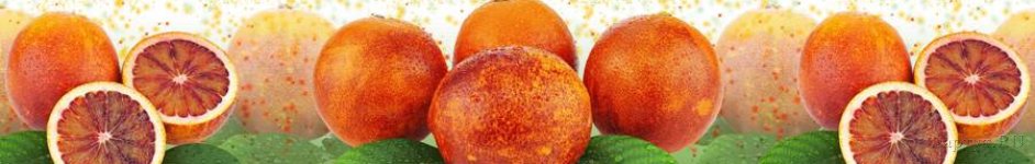 Скинали — Спелые красные апельсины с разрезом и зелеными листьями