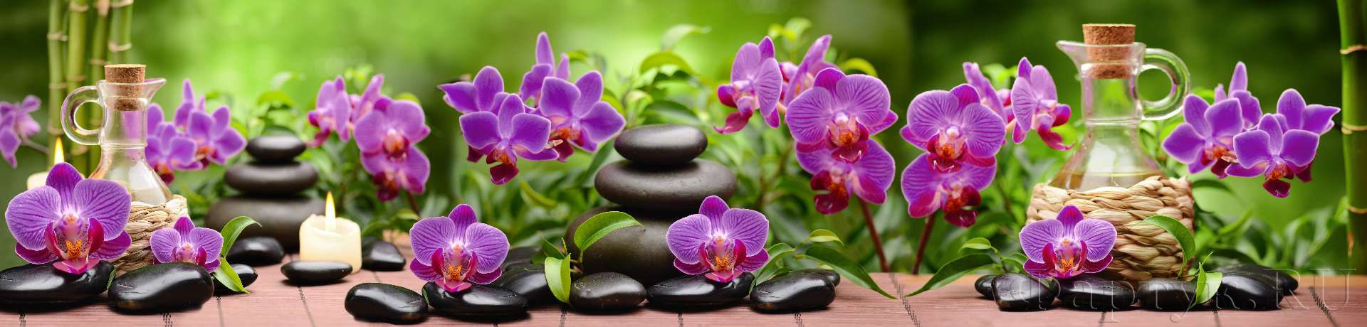 Фиолетовые орхидеи, камни спа