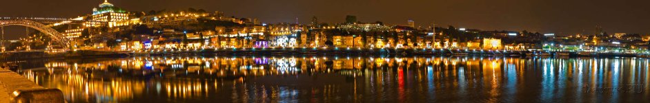 Скинали — Панорама ночного города с мостом